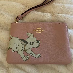 Slightly used Coach Disney Dalmations small wristlet.